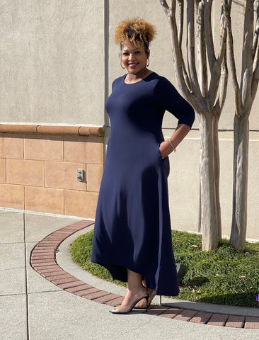 Navy blue long flared maxi with pockets and 3/4 sleeves.